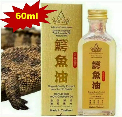Golden Mountain Crocodile Oil 60ml set with dried herbs background