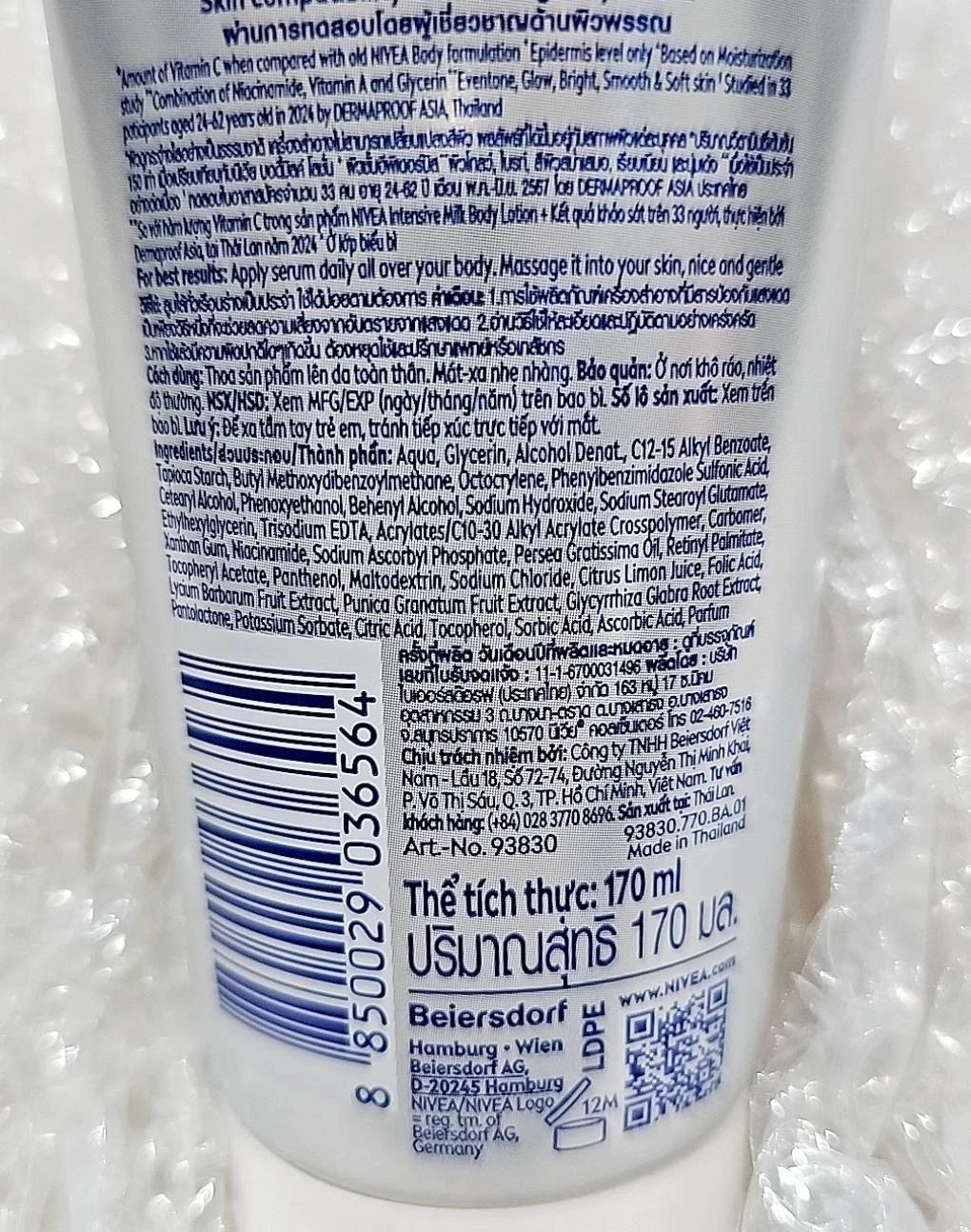 NIVEA Extra Bright Body Serum side angle packaging details and texture