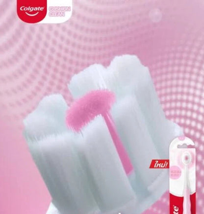 Colgate Cushion Clean Toothbrush close-up of super-dense fluffy soft bristles with pink center for gentle gum massage