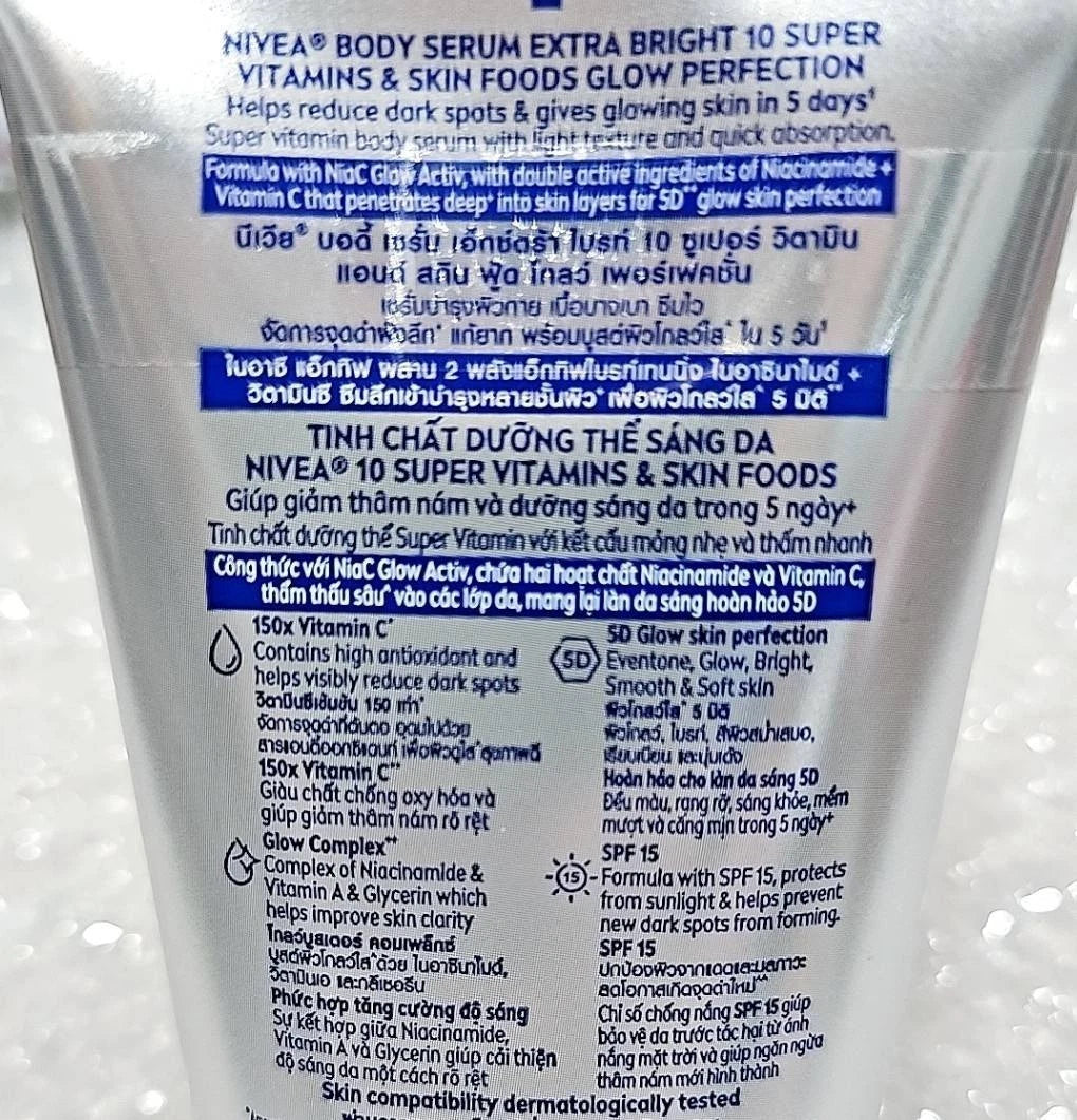 NIVEA Extra Bright Body Serum back view ingredients and product information label