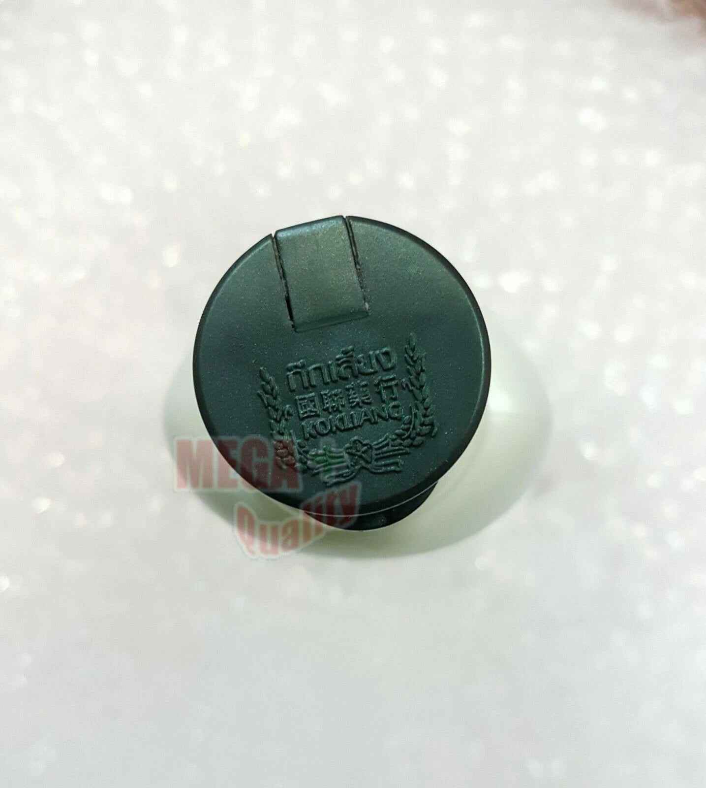 Kokliang Herbal Shampoo cap top view green lid