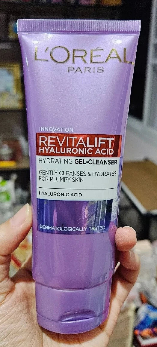 L'Oreal Revitalift Cleanser product held in hand full tube display