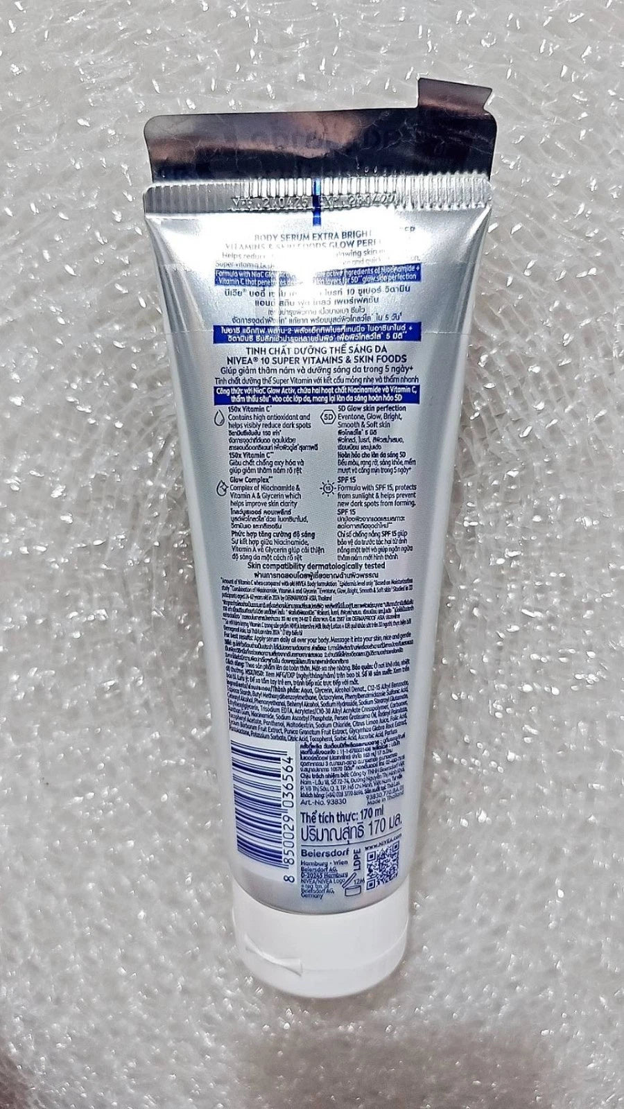 NIVEA Extra Bright Body Serum side view packaging texture and design