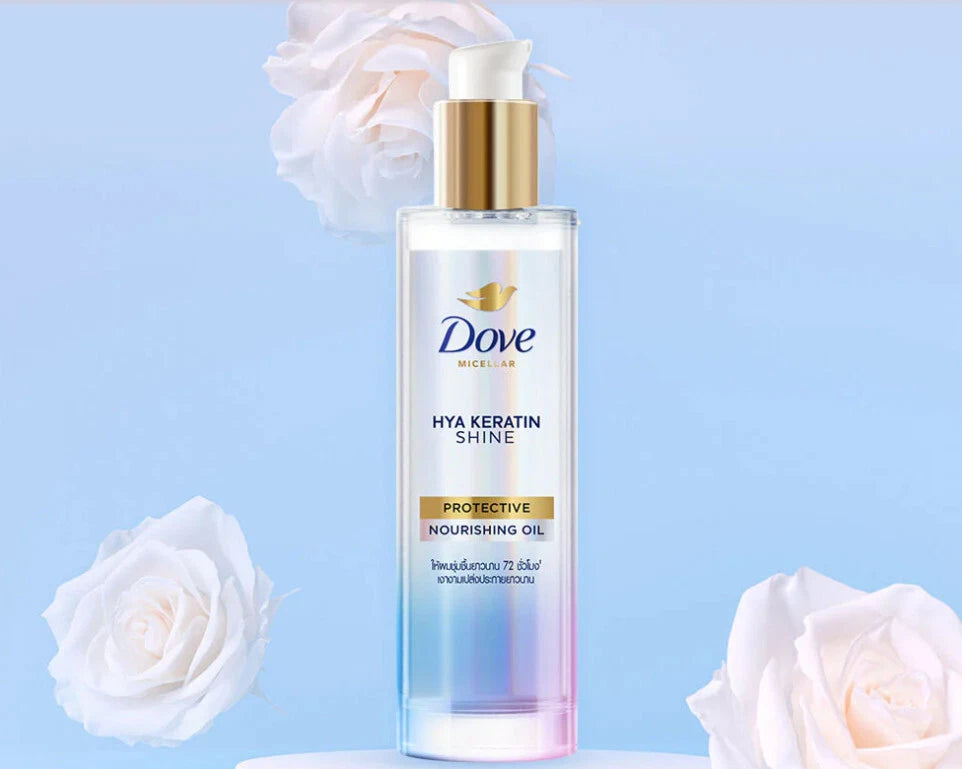 Dove Hya Keratin Oil product display with soft blue background