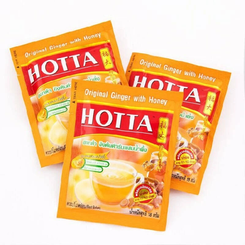 Three orange HOTTA Ginger with Honey Instant Drink sachets displayed separately from main pack.