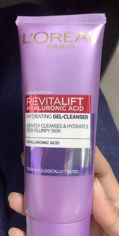 L'Oreal Revitalift Cleanser product held in hand front view