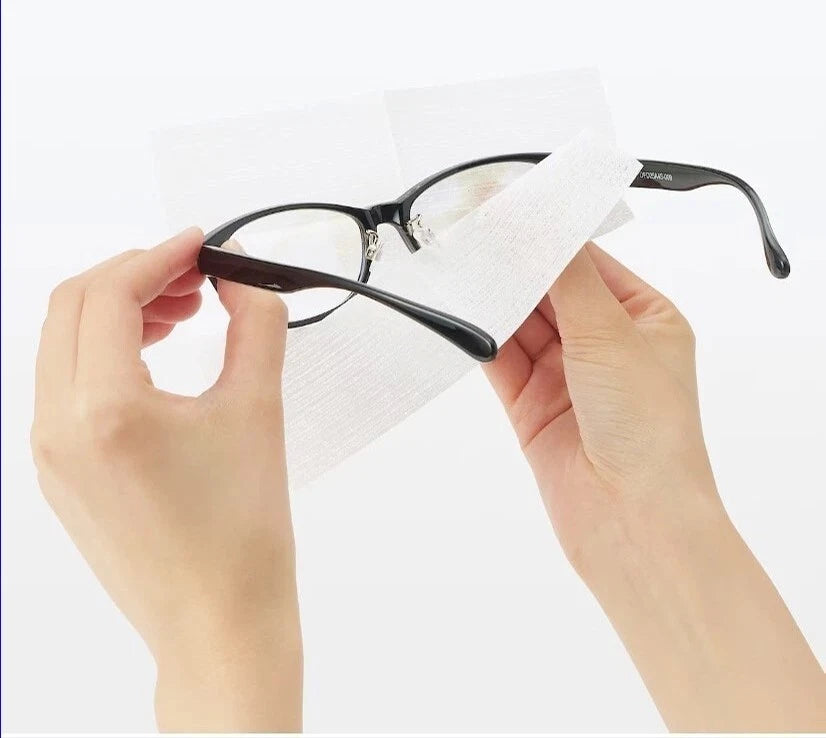 Cleaning eyeglasses with MUJI Lens Wipes Japan for streak-free clarity