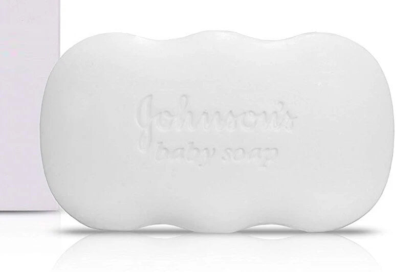 White oval-shaped Johnson Baby Soap bar, unwrapped and ready for use.