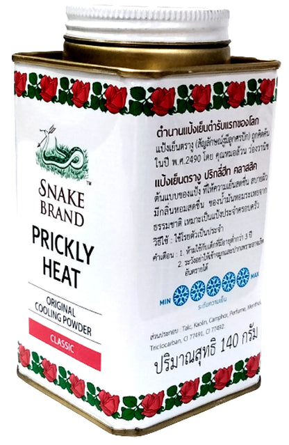 Snake brand prickly heat powder angled can showing vintage metal design and green-red border pattern