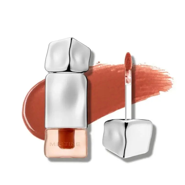 Mistine Velvet Lip Cream V01 packaging and applicator with a terracotta color swatch.