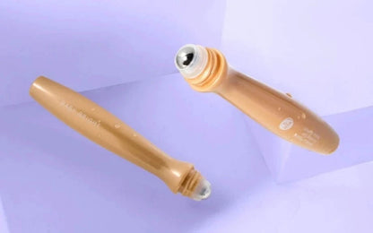 Close-up of the Baby Bright Eye Roller tube and the cooling roller head applicator