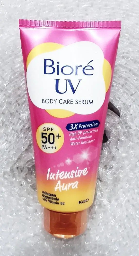Biore UV Intensive Aura Serum Body Care Anti Pollution SPF50+ in a pink tube with sun protection features.