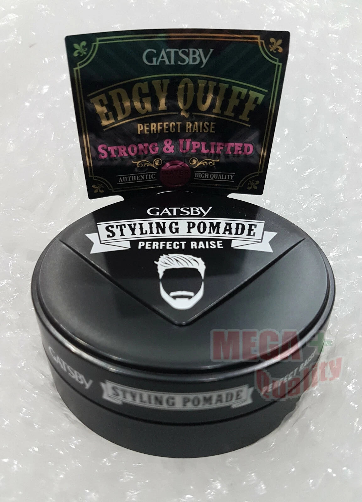 Gatsby Edgy Quiff Pomade jar with the packaging card standing behind it, showing the full retail presentation.