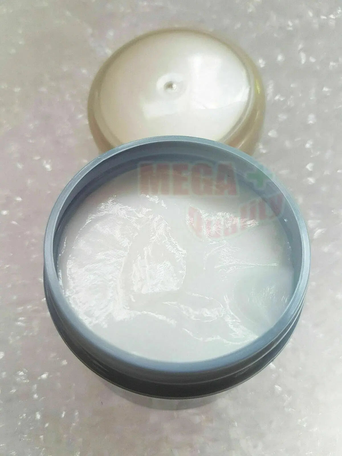 Berina Hair Spa Treatment nourishing cream for rough, dry, damaged hair in an open jar.