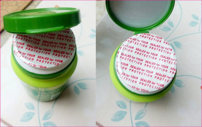 Supaporn Tooth Powder container with green lid and red safety seal for freshness and protection against contamination.