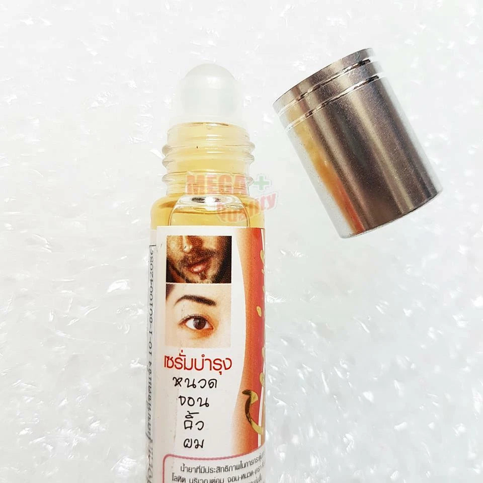 Genive Hair Growth Serum herbal bottle gold cap product close up