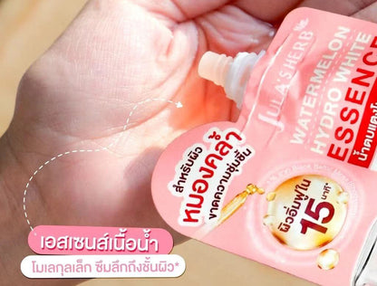 Jula's Herb Watermelon Essence hydration serum shown being applied to skin for radiant, plump appearance.