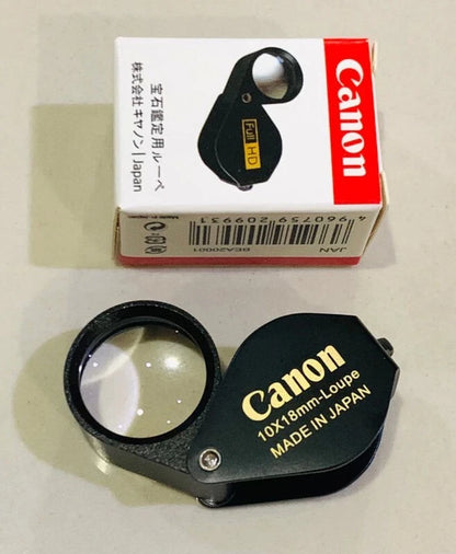 Canon 10x Magnifier full HD 10x18mm jewelry amulet loupe lens in black with packaging.