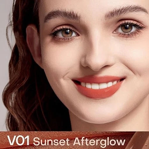 Model wearing Mistine Velvet Lip Cream V01 Sunset Afterglow demonstrating the warm terracotta finish.