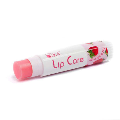 KA Lip Care Plus Strawberry lip balm tube lying diagonally with strawberry print design