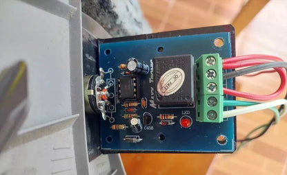Windshield Wiper Timer circuit board installed inside vehicle control box for testing