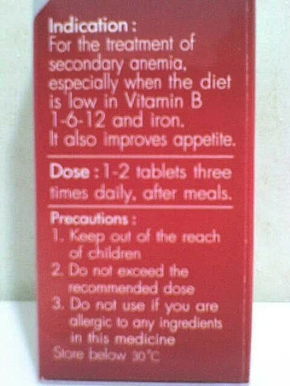 Close-up of HaemoVit tonic ingredients and supplement facts label in white text on red background