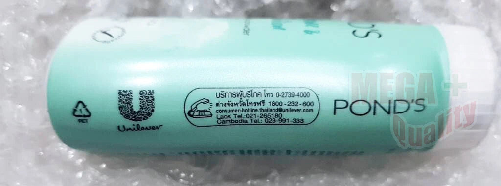 Ponds Dual Acne Oil Powder bottle horizontal view on surface