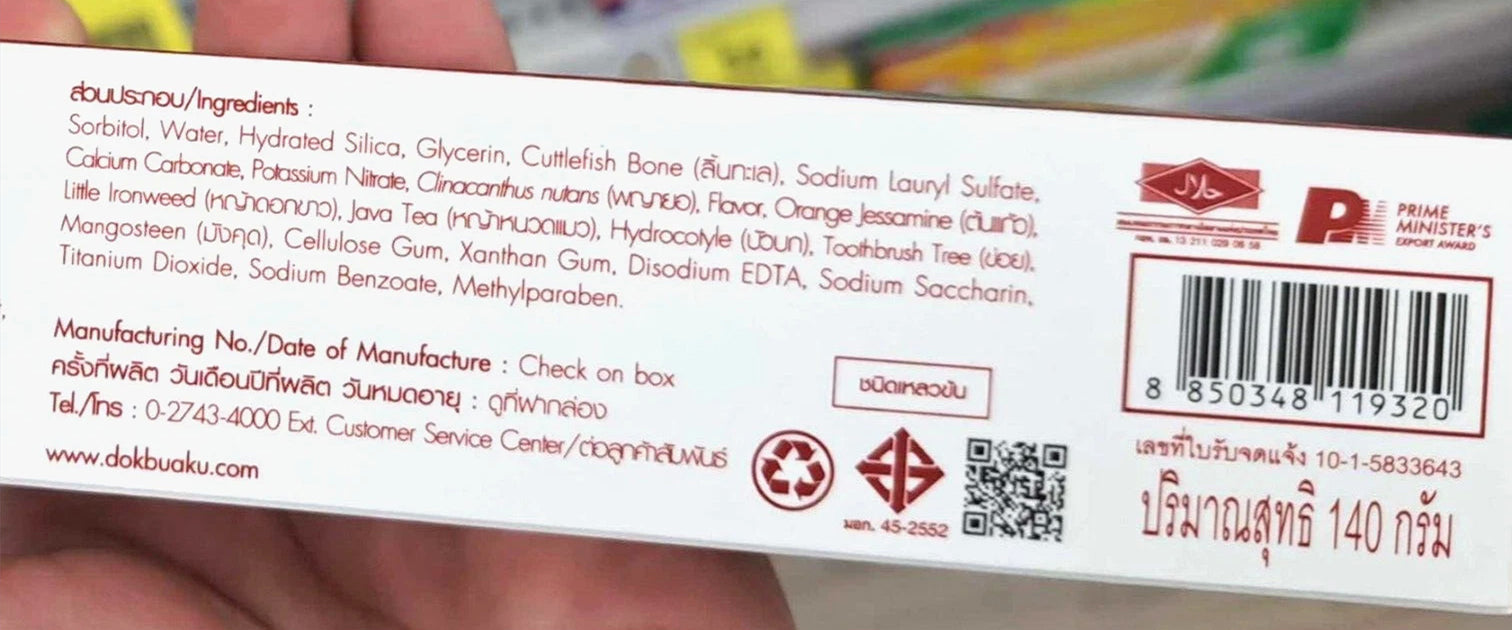 Back of the Twin Lotus Sensitive Toothpaste Dok Bua Ku box showing UPC and Thai text