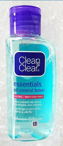  Clean & Clear Essentials Oil-Control Toner bottle front label with oil-free feature highlighted.
