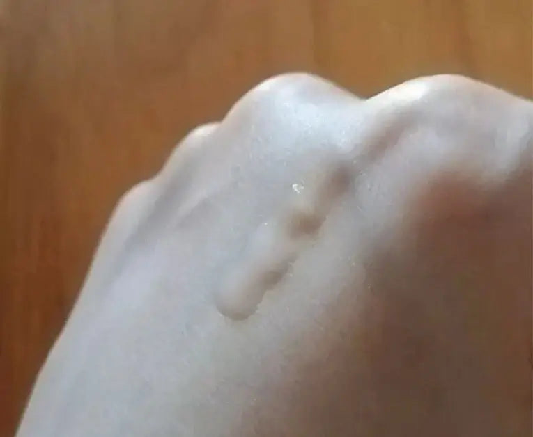 Texture and application of SEWA Overnight Cream Mask cream on skin