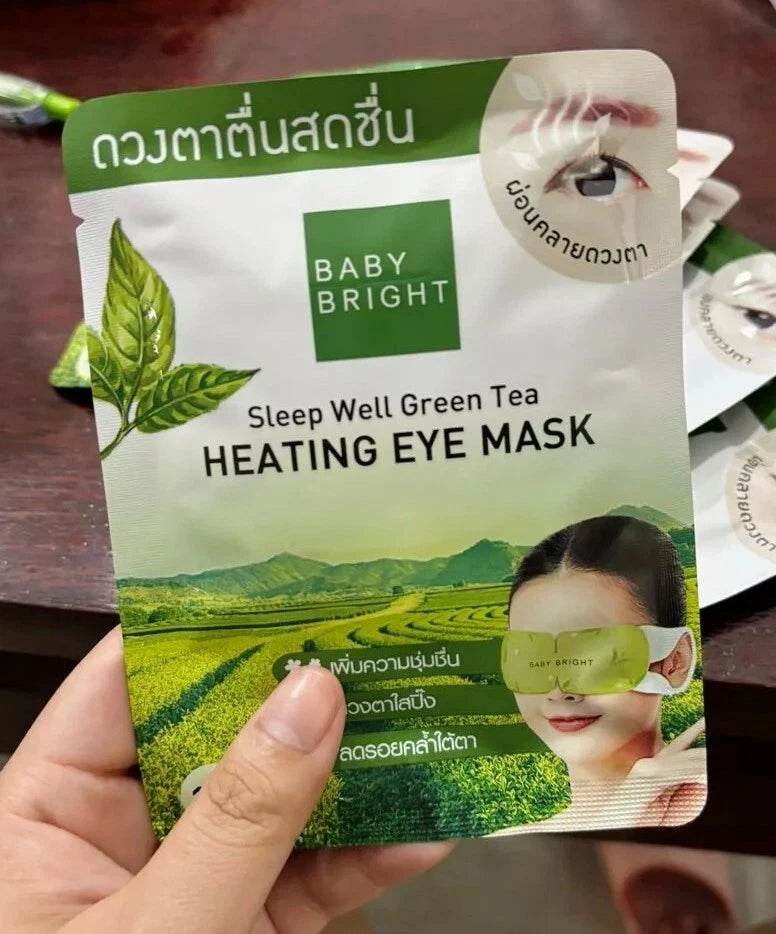 Baby Bright Heating Eye Mask Green Tea front pouch hand holding product