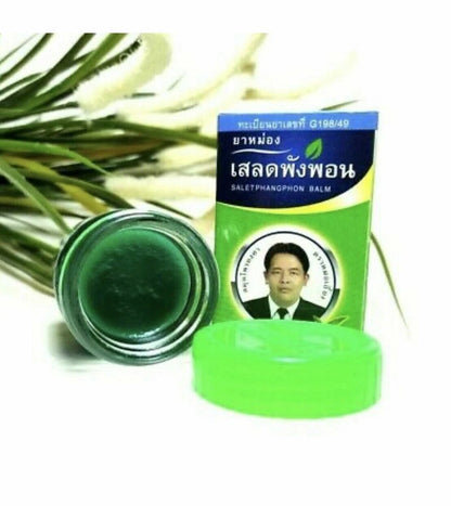 Open jar of Mho-Iang Salet Phangphon Balm 50g Thai herbal massage balm