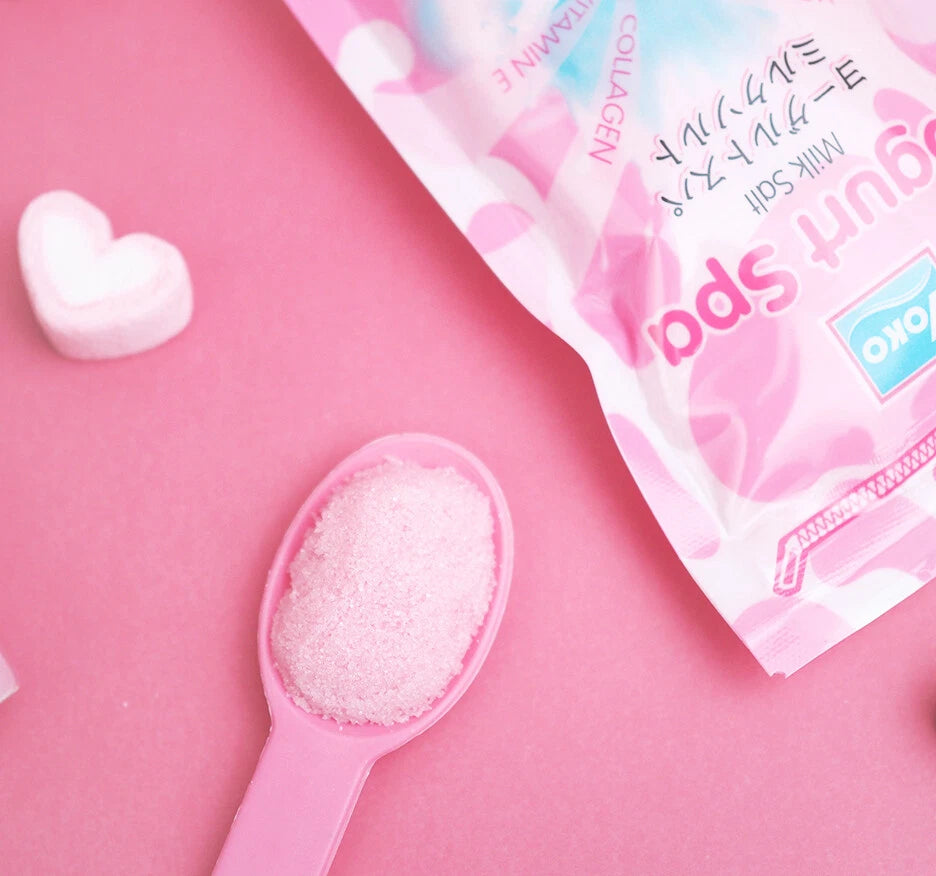 Yoko Yogurt Spa Milk Salt scrub with spoon texture close up