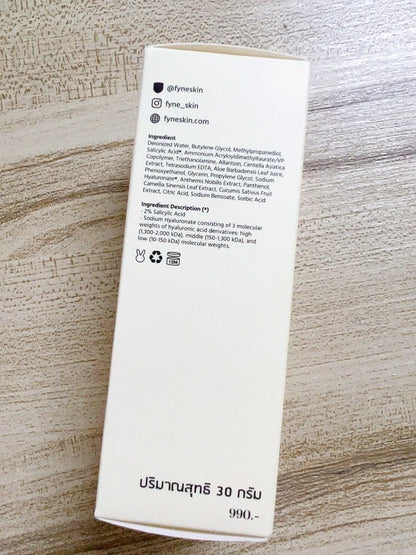 FYNE BHA Clarifying Serum product box photographed on a wooden surface displaying printed details