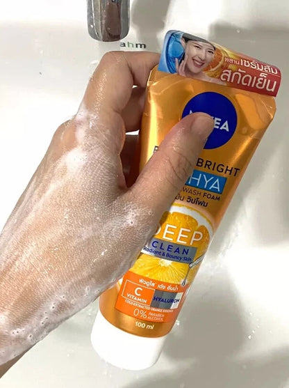 Nivea Extra Bright C Hya Foam vitamin wash foam texture on hand close up
