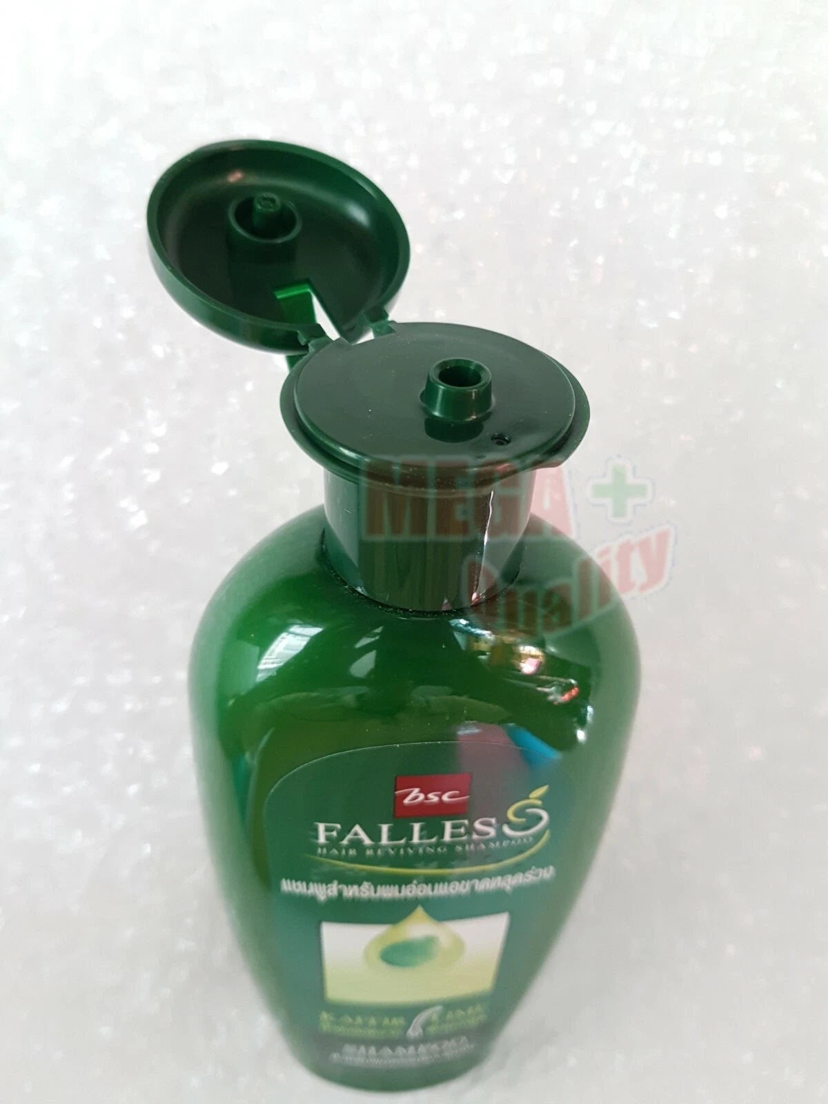 Open flip-cap top of Falles Kaffir Lime Hair Reviving Shampoo 300 ml bottle showing dispenser nozzle.