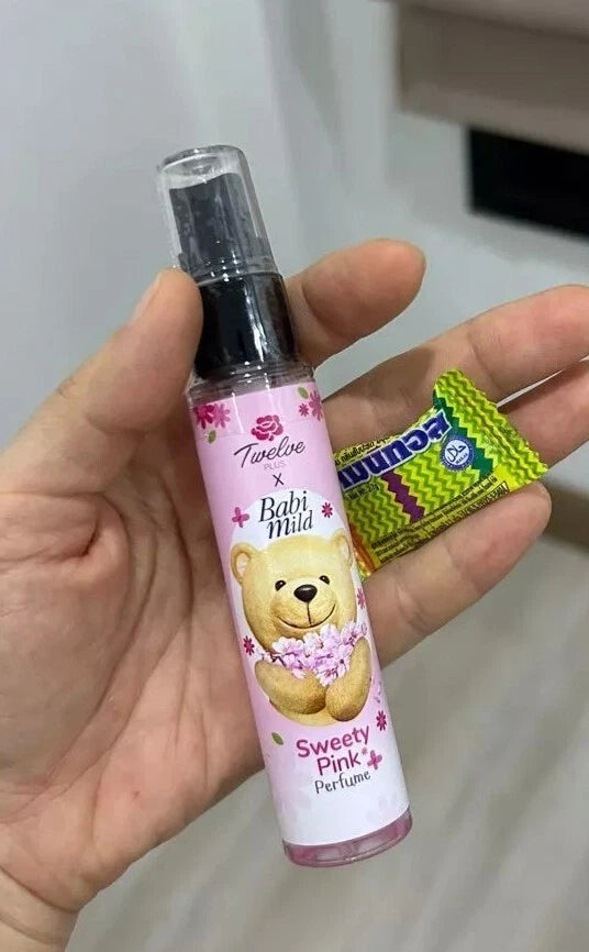 Twelve Plus Babi Mild Sweety Pink perfume spray 25ml held in hand