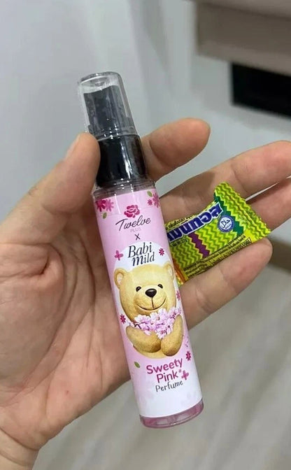 Twelve Plus Babi Mild Sweety Pink perfume spray 25ml held in hand