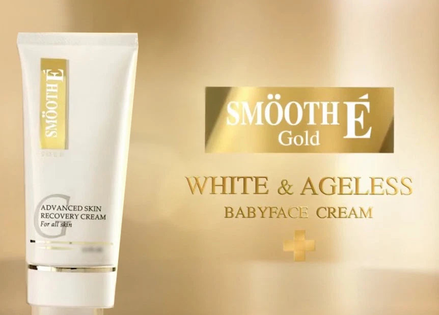 Smooth E Gold Cream Advanced Face Skin Recovery Moisturizer tube on a golden background.