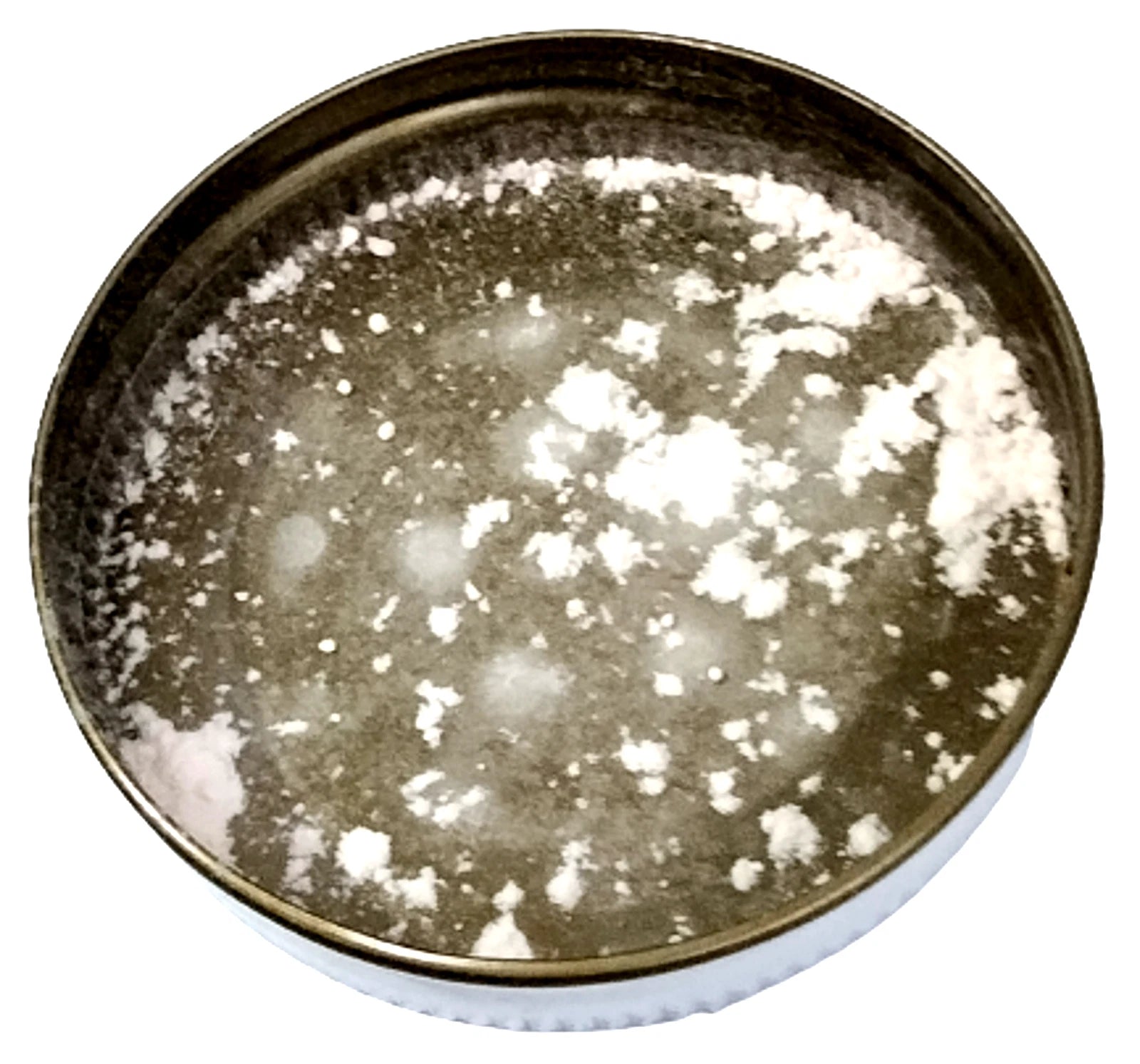 Snake brand prickly heat powder inner lid showing fine cooling talc residue inside the metal can of the Relaxing French Lavender variant