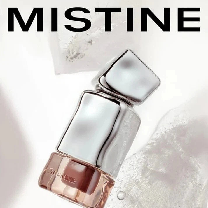 Stylish product shot of the Mistine Velvet Lip Cream tube with a modern silver cap.