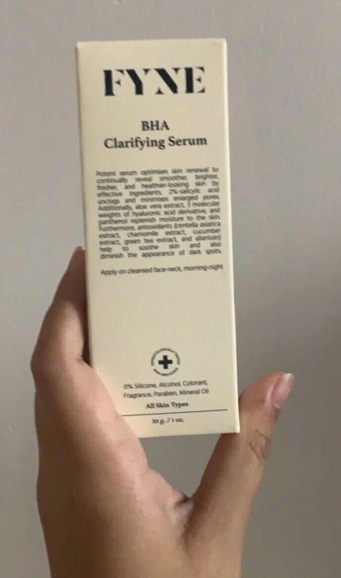 Front view of the FYNE BHA Clarifying Serum product box held in hand displaying label details