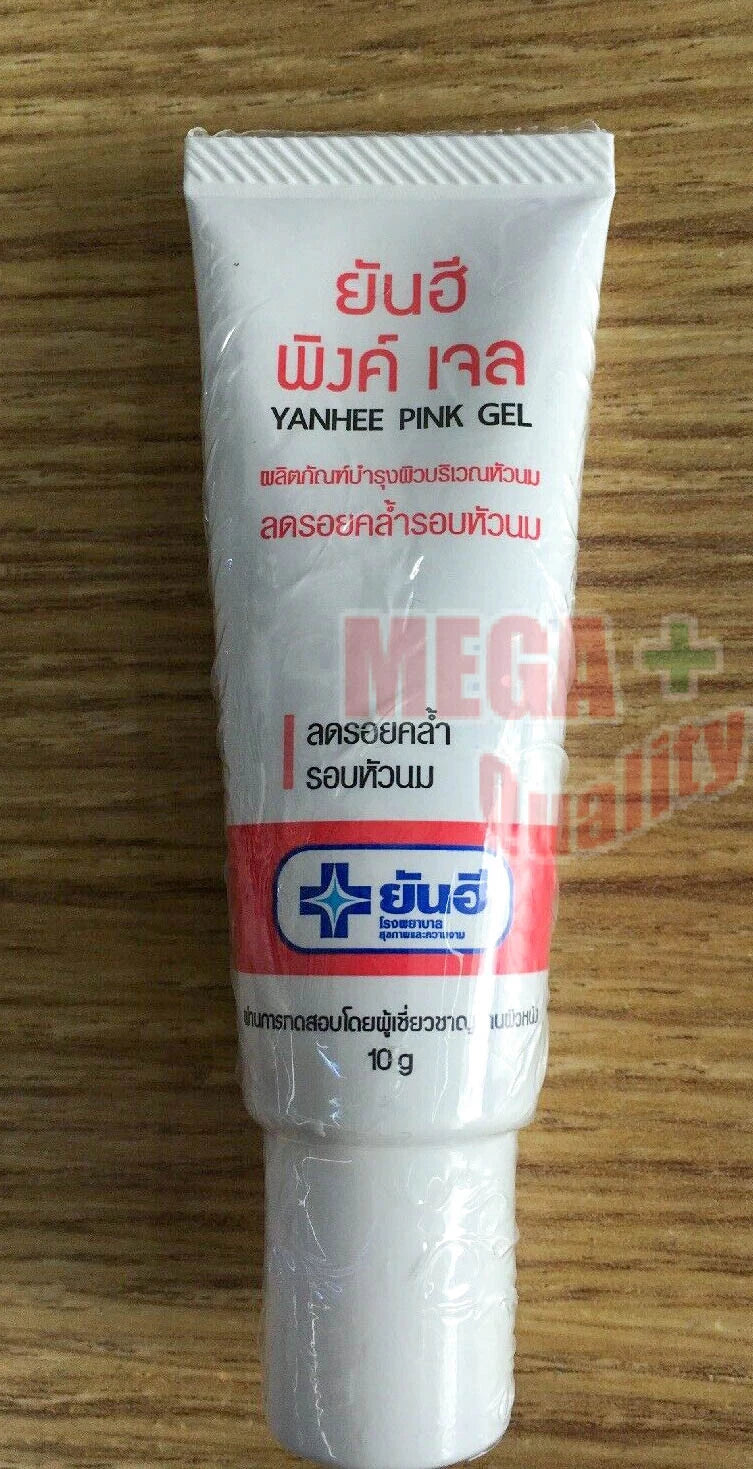 Yanhee Pink Gel full tube standing on wooden surface