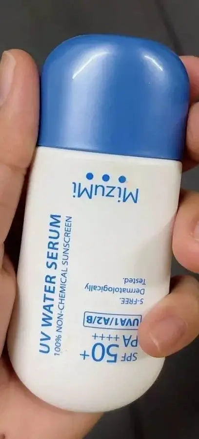 MizuMi UV Water Serum SPF50 PA++++ bottle held in hand
