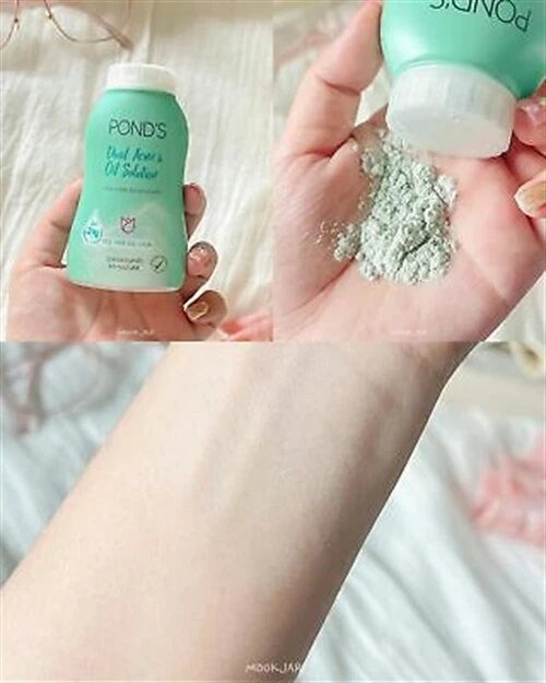 Ponds Dual Acne Oil Powder dispensing powder into hand close up