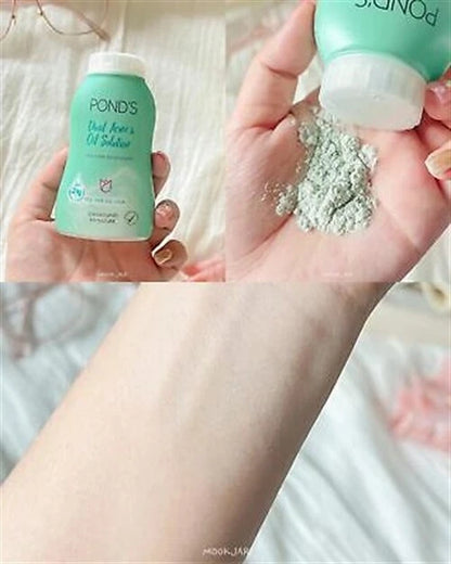 Ponds Dual Acne Oil Powder dispensing powder into hand close up