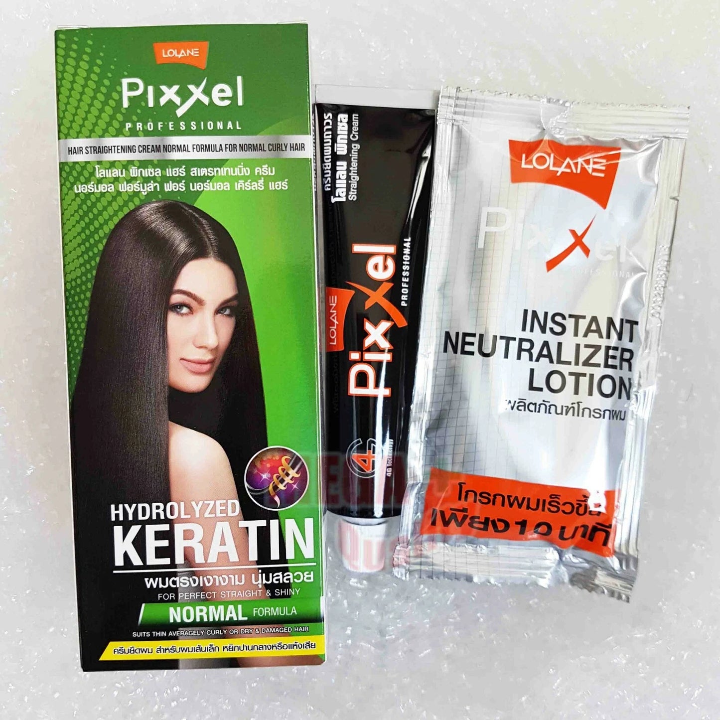 Open box of LOLANE Pixxel Hair Straightening Cream Normal Formula with cream and neutralizer sachets