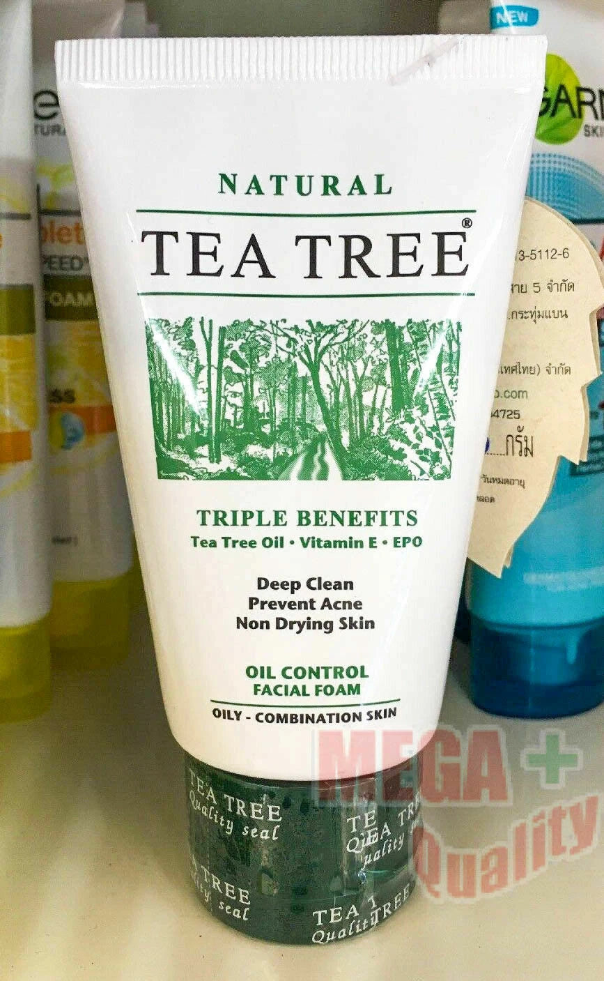 Tea Tree Natural Oil Control Facial Foam 35g held in hand with background products