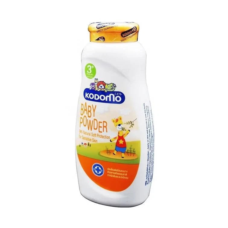 Three-quarter view of Kodomo Baby Powder 3+ orange bottle, showing the side label.