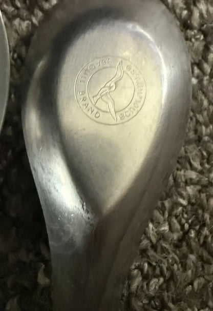 Seagull Stainless Chinese Spoon logo embossed on the surface of a small stainless steel spoon.
